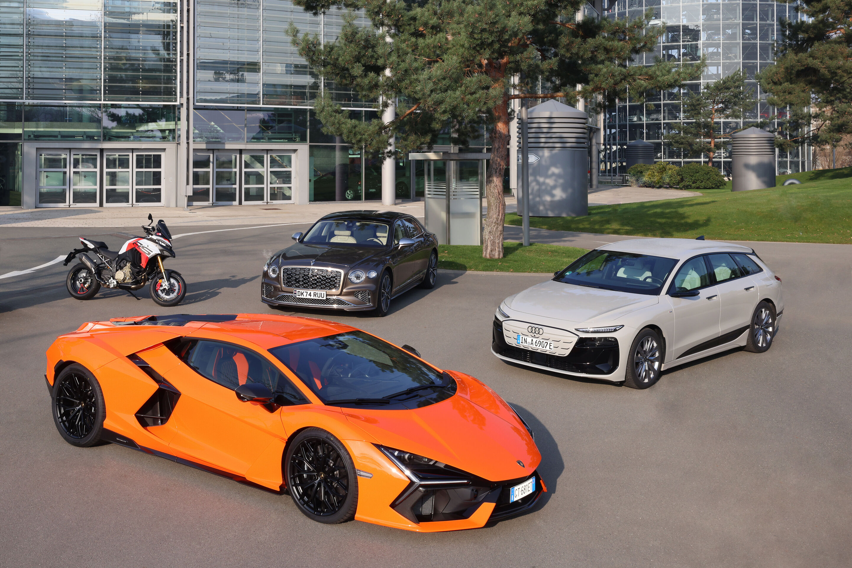 Brand Group Progressive - Ducati Multistrada V4 RS, Lamborghini Revuelto, Bentley Flying Spur Mulliner, Audi A6 e-tron (from left to right)